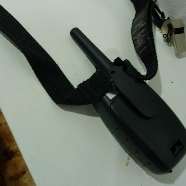1b. radio attached to strap